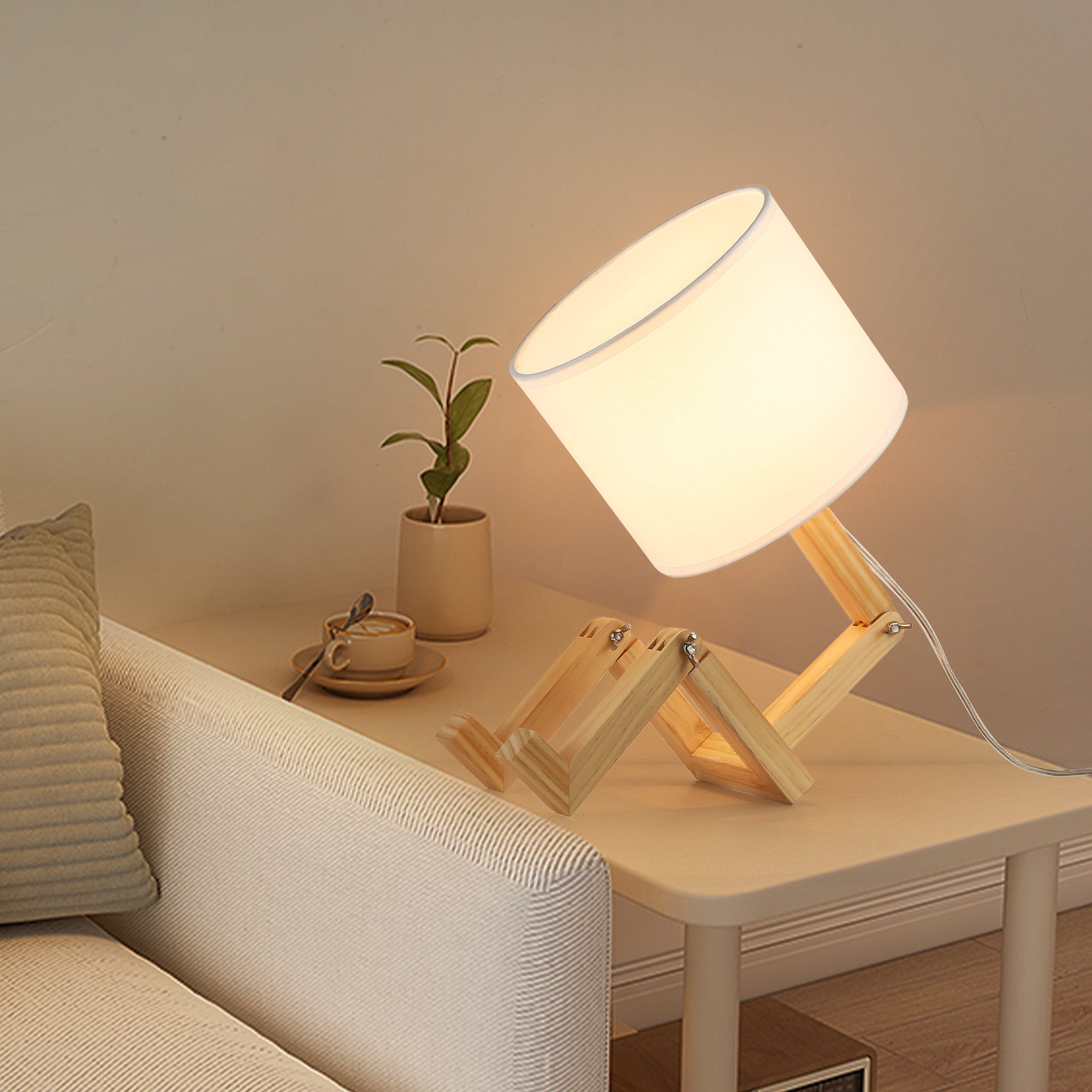 Adjustable natural wood articulated table lamp with white fabric drum shade