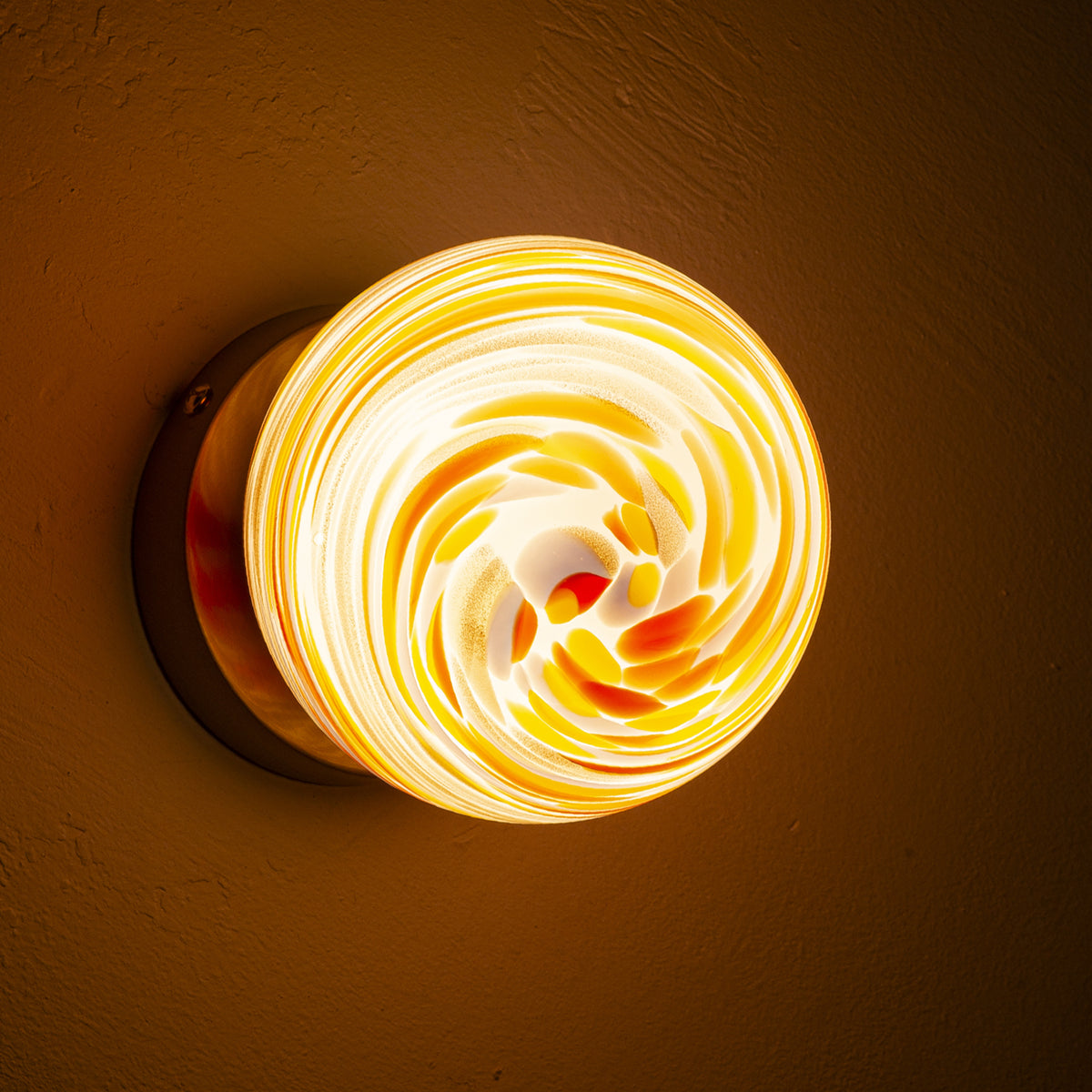 Swirl Glass Wall Sconce with Amber Art Glass Globe