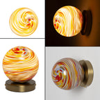 Swirl Glass Wall Sconce with Amber Art Glass Globe